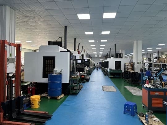 CNC machining centre cutting a metal component